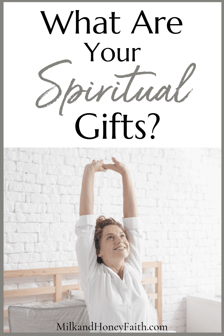 Spiritual Gifts:  Woman raising arms in white shirt