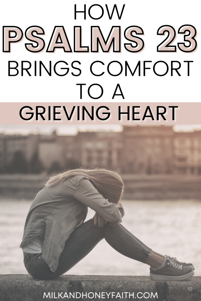 A grieving woman who has her head on her knees.